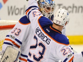 Edmonton Oilers goalie Cam Talbot is congratulated by Matt Hendricks after their 2-1 win over the St. Louis Blues on Tuesday, Feb. 28, 2017, in St. Louis. (Bill Boyce/AP Photo)