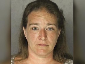 This photo provided by the Allegheny County Police Department in Pittsburgh shows Teresa Drum of Frazer Township, Pa., charged Tuesday, Feb. 28, 2017, with criminal homicide after police say she fatally shot her husband Dennis Drum Sr. on Monday, Feb. 27, then took a cellphone photo of his body and showered before calling 911. (Allegheny County Police Department via AP)
