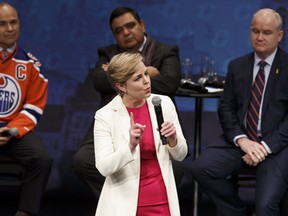 Candidate Kellie Leitch peaks during the Conservative Party of Canada leadership debate in Edmonton on Tuesday, February 28, 2017.  (Postmedia Network)