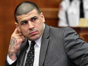 In this Dec. 27, 2016, file photo, former New England Patriots player Aaron Hernandez appears in Suffolk Superior Court for a pretrial hearing before Judge Jeffrey Locke in Boston. (Josh Reynolds/The Boston Globe via AP, Pool, File)