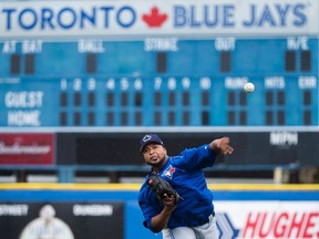 Toronto Blue Jays starting pitcher Francisco Liriano warms up during spring training in Dunedin on Feb. 22, 2017. (THE CANADIAN PRESS/Nathan Denette)