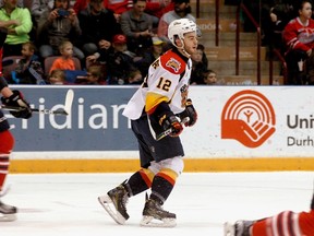 Erie Otters forward Alex DeBrincat (12) is seen in action against the Oshawa Generals on Monday, February 20, 2017. (The Canadian Press)