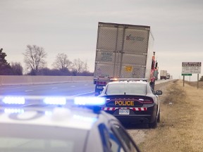 The SIU is probing how the driver of this truck was hurt after an OPP pursuit on Highway 401 Tuesday. (MIKE HENSEN, The London Free Press)