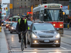 Perhaps it is time to change the Ontario Highway Traffic Act, which considers bicycles to be “vehicles” and subject to rules of the road. (ERNEST DOROSZUK/TORONTO SUN)