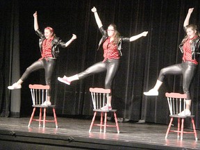 Great Lakes Secondary students Kayla Nicefield, left, Leah Purdy and Reena Herbstreit perform during a preview of the Revue at the Sarnia high school this week. Shows are March 2-4, starting at 7:30 p.m. (Tyler Kula/Sarnia Observer)
