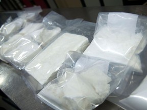 Members of the Edmonton Drug and Gang Enforcement Unit (EDGE) seized hundreds of thousands of dollars of cocaine after executing search warrants at two southwest Edmonton residences on Thursday, Feb, 23, 2017. Supplied