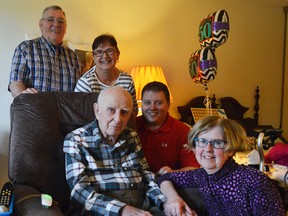 Frank Talbourdet, seated, turned 100 March 1, surrounded by (from left) relatived Pat Rowan, Carol Rowan, and Curtis Rowan, and daughter Jane Ablett. Talbourdet still tunes in to the news every morning, to the point where his family often asks him for the news rather than turn on the radio themselves.