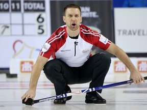 Team Newfoundland/Labrador skip Brad Gushue calls to his sweepers in the 10th end against Team Canada in the 2015 Brier semi-final game at the Scotiabank Saddledome in Calgary on March 7, 2015. (Mike Drew/Calgary Sun)