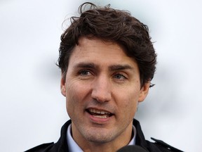 Prime Minister Justin Trudeau speaks to media after meeting with members of the Canadian Forces at CFB Esquimalt in Esquimalt, B.C., on Thursday, March 2, 2017. THE CANADIAN PRESS/Chad Hipolito