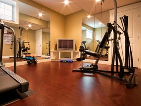 Cork floors, such as the one used in this exercise room, are increasingly being used in high traffic areas in homes because they?re comfortable on the feet and absorb noise. (Absolute Hardwood)