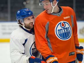Newly acquired David Desharnais skates with teammate Eric Gryba his first Edmonton Oilers practice following Wednesday's trade deadline. The two are 21 cm apart in height. (Shaughn Butts)