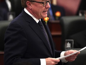Minister of Education David Eggen introduces Bill 1 after the Speech from the Throne was read by Lieutenant Governor Lois Mitchell during the third session of the 29th Legislature in Edmonton, Thursday, March 2, 2017. Ed Kaiser/Postmedia