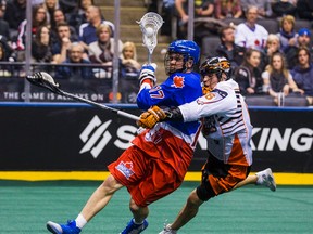 The Buffalo Bandits’ Alex Kedoh Hill (right) scored the late winner against the Rock on Feb. 25.