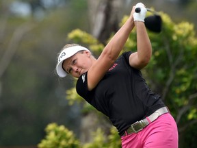Brooke Henderson tees off during the HSBC Women's Champions golf tournament at the Sentosa Golf Club in Singapore on March 3, 2017. (ROSLAN RAHMAN/AFP/Getty Images)