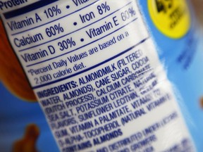 This Feb. 16, 2017, photo shows the ingredients label for almond milk at a grocery store in New York. (AP Photo/Patrick Sison)