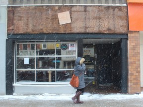 The Chronic Hub on Dundas Street, one of five marijuana dispensaries raided in a coordinated crackdown Thursday, had its sign removed. DALE CARRUTHERS / THE LONDON FREE PRESS