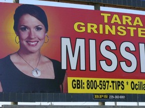 In this Oct. 4, 2006, file photo, missing teacher Tara Grinstead is displayed on a billboard in Ocilla, Ga. (Elliott Minor/AP Photo/Files)