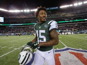 In this Nov. 27, 2016, file photo, New York Jets wide receiver Brandon Marshall walks off the field after the team's NFL football game against the New England Patriots in East Rutherford, N.J. (AP Photo/Julio Cortez, File)
