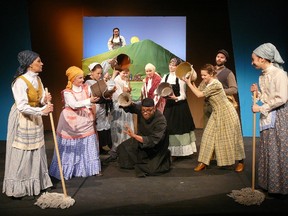 Esme Purdy, above at back, Cassel Miles, centre, along with Renee O’Farrell, from left to right, Naomi Greer Ballance, Hayley Hudson, Elizabeth Taylor, Oscar Cadeau, Beth Sirett, Phyllis Scully, Angie Dorey, Damien Schaefer and Vanessa Delzotto Hammond star in Village of Idiots.  (Courtesy of Grant Buckler)