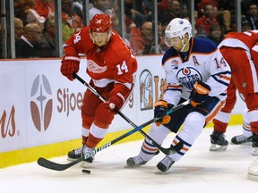 Detroit Red Wings right wing Gustav Nyquist (14) of Sweden skates against Edmonton Oilers right wing Jordan Eberle (14) during the third period of an NHL hockey game in Detroit, Sunday, Nov. 6, 2016. The Oilers defeated the Red Wings 2-1. The Oilers host the Red Wings on Saturday at Rogers Place.