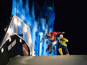 Russia's Dmitry Murlichkin, left, leads Finland's Janne-Petteri Mynttinen during qualifiers at the Red Bull Crashed Ice world championship, in Ottawa on Friday, March 3, 2017.