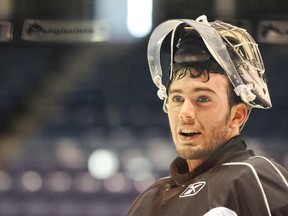 Alain Valiquette takes a breather during practice with the Sudbury Wolves of the Ontario Hockey League in 2010-11. The Sudbury native was hired Tuesday as the Wolves' new goalie coach. Gino Donato/The Sudbury Star/Postmedia Network