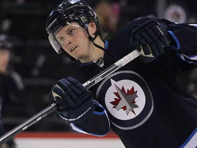 Jets defenceman Jacob Trouba returned from a two-game suspension and played a big role in Friday's 3-0 win over the St. Louis Blues.