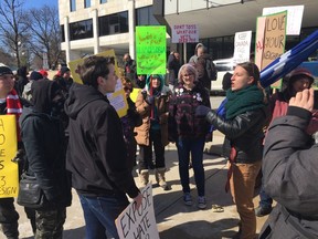 Two groups squared off at city hall Saturday about a motion before Parliament to condemn Islamophobia (Hank Daniszewski/The London Free Press)