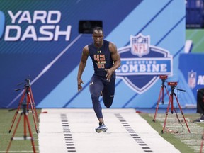 Wide receiver John Ross of Washington runs the 40-yard dash in an unofficial record time of 4.22 seconds during day four of the NFL Combine at Lucas Oil Stadium on March 4, 2017 in Indianapolis, Indiana. (Photo by Joe Robbins/Getty Images)