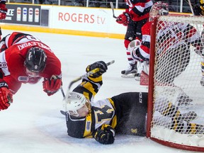 Kingston Frontenacs’ Justin Pringle is sent crashing into the Ottawa 67’s net after missing a shot during yesterday’s game at TD Place Arena. (ASHLEY FRASER/Postmedia Network)