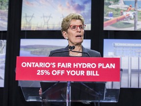 Ontario Premier Kathleen Wynne announces cuts to hydro rates on average of 25 per cent during a news conference in Toronto on Thursday, March 2, 2017. (Ernest Doroszuk/Toronto Sun)