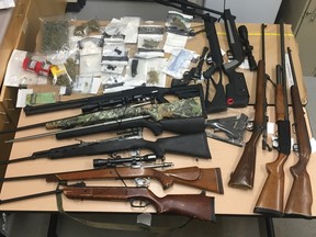 The Peace Regional RCMP with the assistance of the Emergency Response Team executed two search warrants at a residence on 82nd Avenue and 94th Street in the town of Peace River.  In total 57 charges resulted from the investigation notably; 44 of these are firearms related charges, 5 breach of recognizance charges.