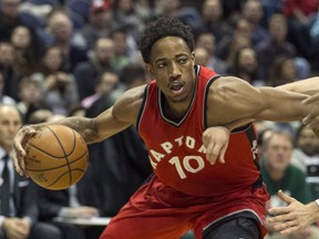 Toronto Raptors' DeMarre DeRozan drives against Milwaukee Bucks' Matthew Dellavedova during the first half of an NBA basketball game Saturday, March 4, 2017, in Milwaukee. (AP Photo/Tom Lynn)