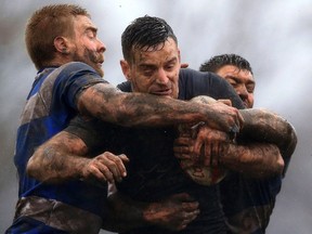 Siddal's Sean Garrod, left, and Ben Hinsley tackle Toronto Wolfpack's Craig Hall. (AP)