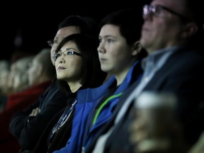 Filmmaker Doris Liu watches intently from a front-row seat at the world premiere screening of her documentary, In the Name of Confucius, at Downtown DocFest on Friday March 3, 2017 in Belleville, Ont. The film explores the growing global controversies surrounding China's multi-billion dollar Confucius Institute. Tim Miller/Belleville Intelligencer/Postmedia Network