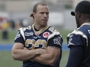 Winnipeg Blue Bombers player Shawn Gallant (left) chats during practice Saturday, September 12, 2009. Gallant and fellow former Bombers and current Winnipeg police officer Errol Brown as well as former university and junior football players will be assisting with an inner city after-school flag football program for youth beinf put on by the Blue Bombers and the Winnipeg Police Association in  partnership with the University of Winnipeg, Sport Manitoba, Canadian Tire Jumpstart Charities and Spence Neighbourhood Association.
MARCEL CRETAIN/Winnipeg Sun/Postmedia Network