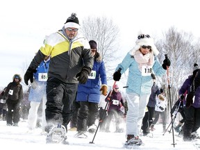 Participants take part in the Northern Cancer Foundations Trek for Cancer Snowshoe Fun Run at Kivi Park in Sudbury, Ont. on Sunday March 5, 2017. More than 200 participants took part in the event raising over $100,000 due in part to Lily Fielding matching all the donations.Gino Donato/Sudbury Star/Postmedia Network