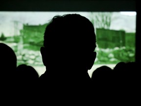 Audience members are shown in silhouette as they watch the film, Hollywood Of The North, at Downtown DocFest on Saturday March 4, 2017 in Belleville, Ont. Tim Miller/Belleville Intelligencer/Postmedia Network