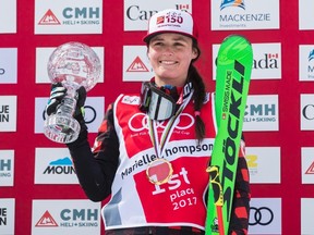 Marielle Thompson of Canada holds the FIS Crystal Globe for finishing first in points on the season after winning gold during the FIS Ski Cross World Cup 2017 in The Blue Mountains, Ont., Sunday, March 5, 2017. (Mark Blinch/The Canadian Press)
