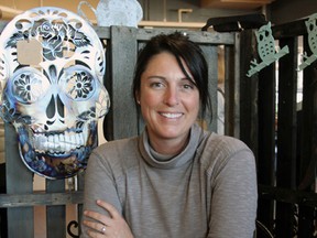 Tonya Maggiacomo, owner of Island Metal Works, at the She Creates One of a Kind show at St. Lawrence College on Saturday. (Steph Crosier/The Whig-Standard)