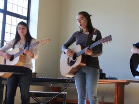 From left, Kate Anderson, Alyssa Labrie and Hope Murphy audition at Queen's University on Saturday for the Limestone Learning Foundation's Canadian Crystal fundraiser. (Steph Crosier/The Whig-Standard)