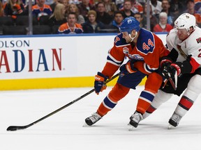 Senators defenceman Dion Phaneuf (right) interrupts Oilers forward Zack Kassian (left) on a breakaway during second period NHL action at Rogers Place in Edmonton on Oct. 30, 2016. Six of seven Canadian teams are either holding a playoff spot or very close to one with five weeks left in the season. (Ian Kucerak/Postmedia Network)