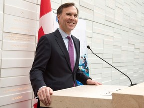 Federal Finance Minister Bill Morneau smiles after being asked about the timing of the next federal budget after making an announcement at Ryerson University in Toronto on Friday, March 3, 2017. (THE CANADIAN PRESS/Frank Gunn)