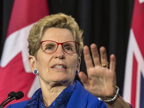 Premier Kathleen Wynne answers questions at Queen's Park in Toronto on Monday, March 6, 2017. (Craig Robertson/Toronto Sun)