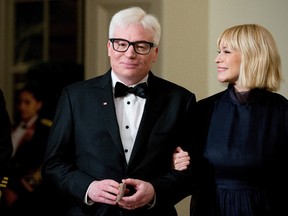 Actor Mike Myers and his wife Kelly arrive for a State Dinner for Canadian Prime Minister Justin Trudeau, Thursday, March 10, 2016, at the White House in Washington. Myers says he's written a dramatic series for HBO that, if greenlit, could serve as his much-anticipated return to TV. THE CANADIAN PRESS/AP /Andrew Harnik