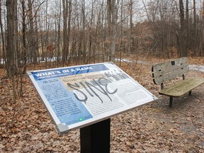 A number of the newer signs and trash cans, as well as the south washroom, at Lemoine Point Conservation area have graffiti on them after someone tagged them in black and white spray paint. (Julia McKay/The Whig-Standard)