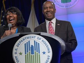 Housing and Urban Development Secretary Ben Carson shares a laugh with his wife Lacena "Candy" Carson as they are introduced to speak to HUD employees in Washington, Monday, March 6, 2017. (AP Photo/Susan Walsh)