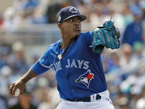 Toronto Blue Jays starting pitcher Marcus Stroman goes into his windup during a spring training game against the Tampa Bay Rays on March 5, 2017, in Dunedin, Fla. (AP Photo/Chris O'Meara)