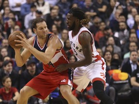 Toronto Raptors forward DeMarre Carroll guards aginast Washington Wizards guard Bojan Bogdanovic during an NBA game on March 2, 2017. (Jack Boland/Toronto Sun/Postmedia Network)