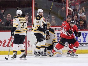 Senators’ Jean-Gabriel Pageau celebrates his goal against Boston Bruins goaltender Tuuka Rask during last night’s game. (THE CANADIAN PRESS)